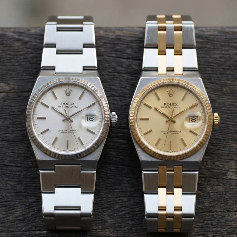 Two genuine Rolex Oysterquartz Datejust watches — steel and two-tone — showing the distinctive angular integrated bracelet design